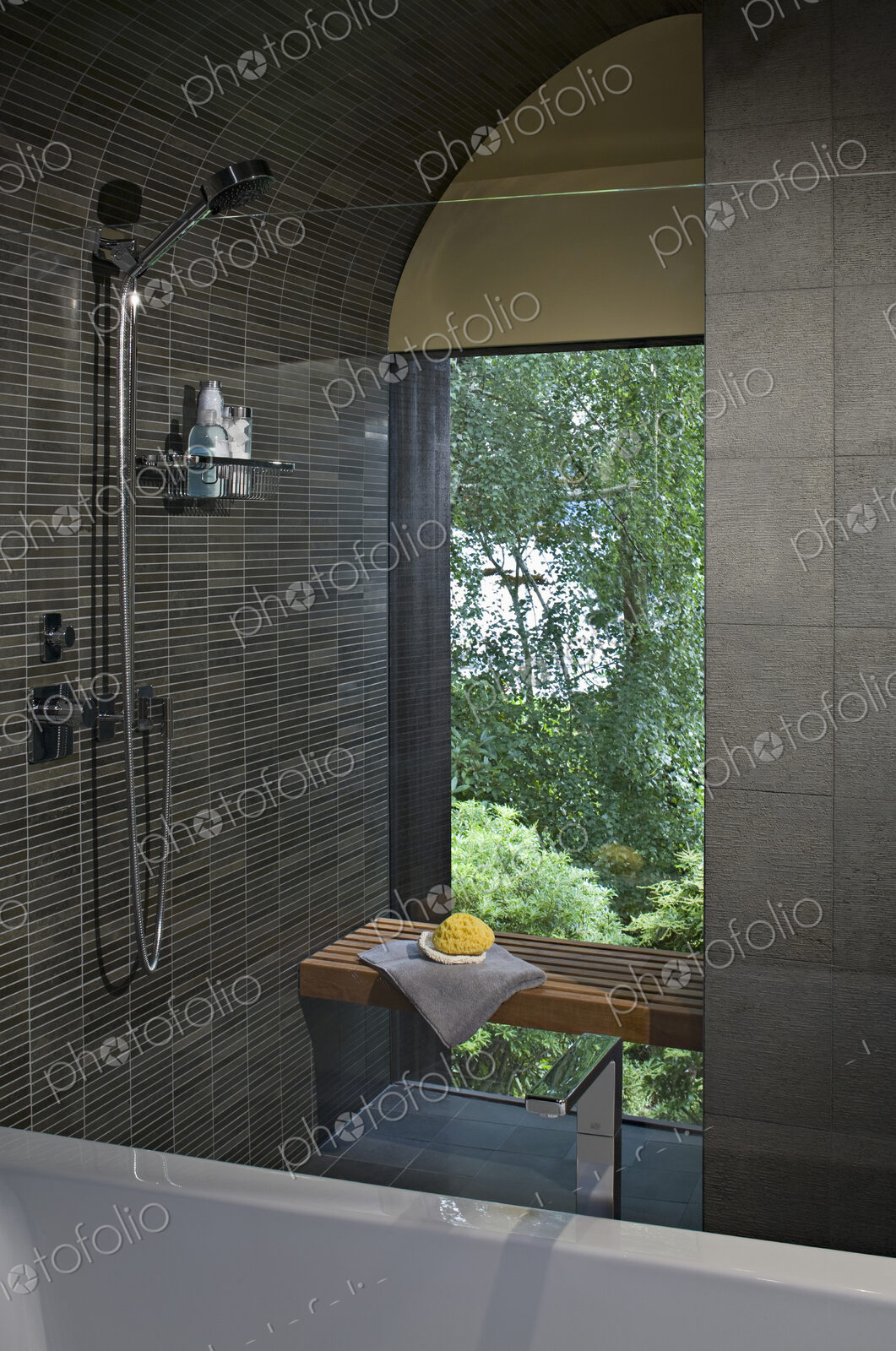 Shower and bench in modern bathroom