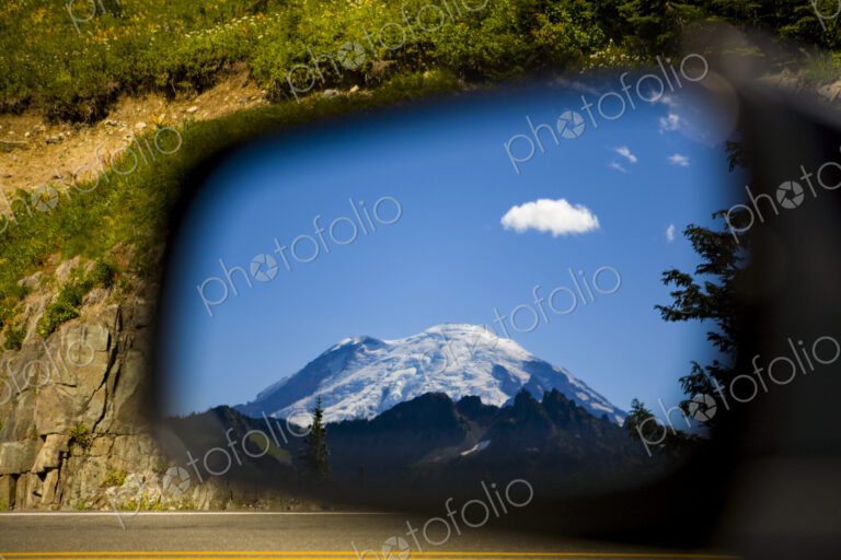 Side View Mirror Reflection of Mount Rainier peak in Mount Rainier national park,…