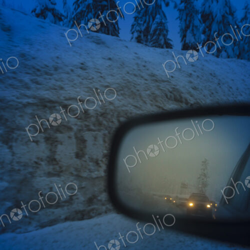 Side mirror view of traffic jam on Snoqualmie Pass, WA USA