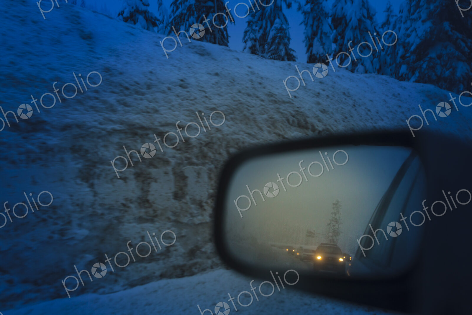 Side mirror view of traffic jam on Snoqualmie Pass, WA USA