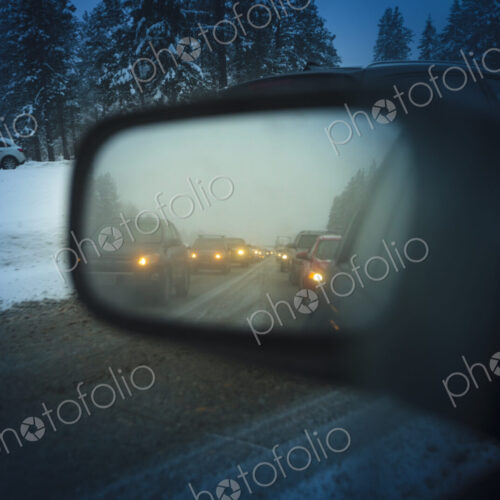 Side mirror view of traffic jam on Snoqualmie Pass, WA USA Side mirror view of traffic jam on Snoqualmie Pass, WA USA