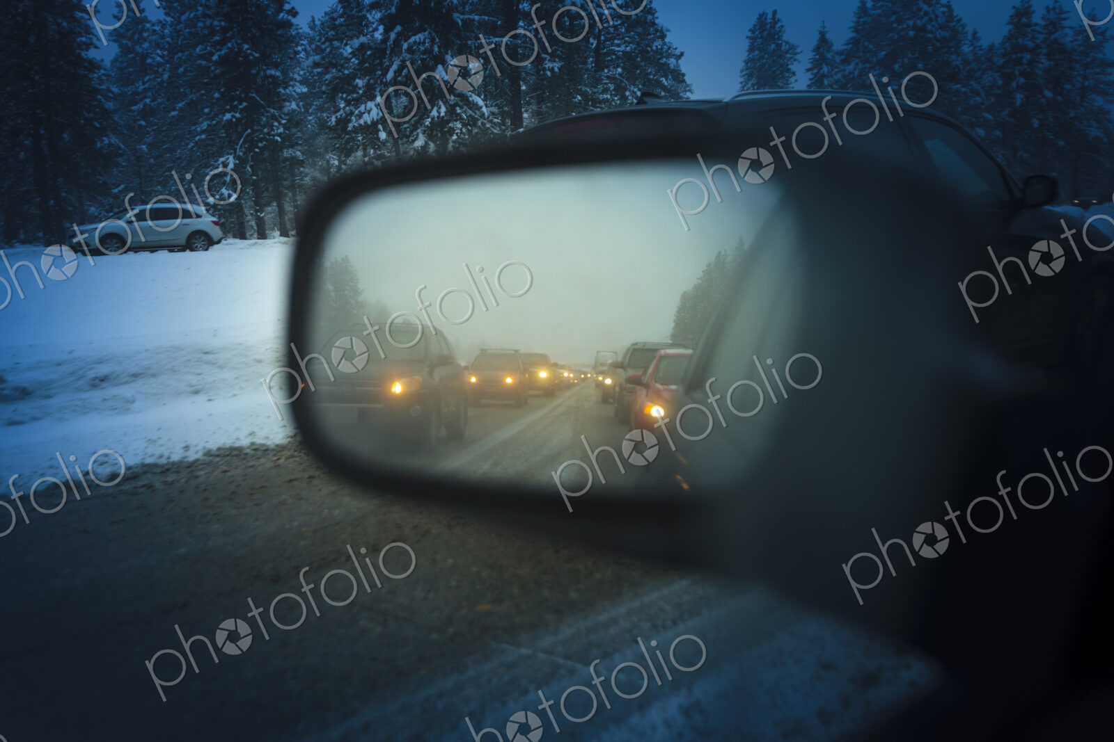 Side mirror view of traffic jam on Snoqualmie Pass, WA USA
