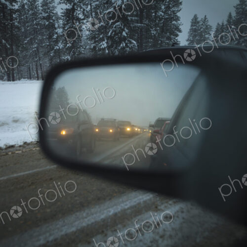 Side mirror view of traffic jam on Snoqualmie Pass, WA USA Side mirror view of traffic jam on Snoqualmie Pass, WA USA