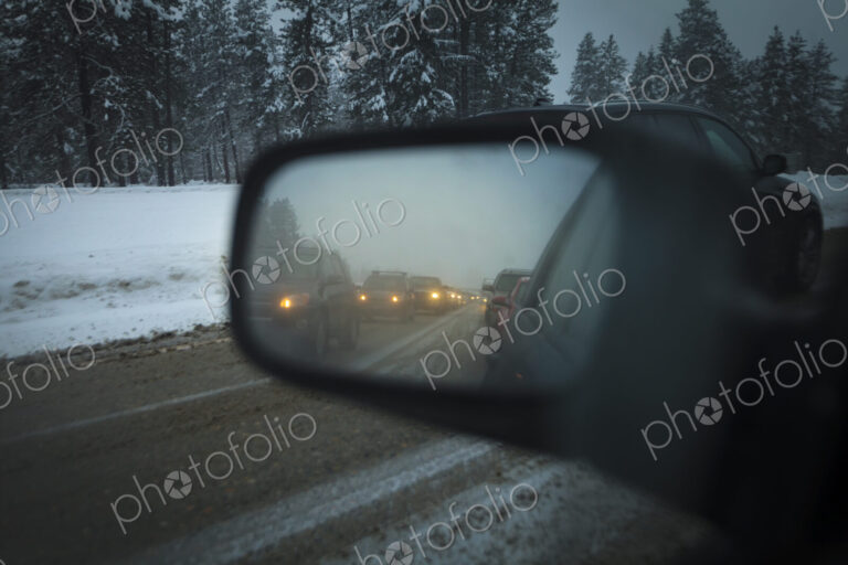 Side mirror view of traffic jam on Snoqualmie Pass, WA USA
