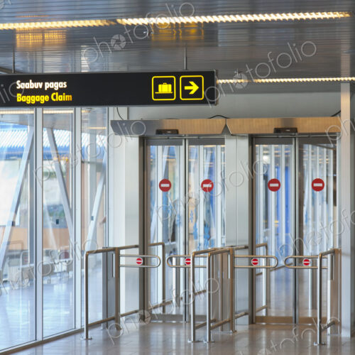 Sign Leading to Baggage Claim Sign Leading to Baggage Claim