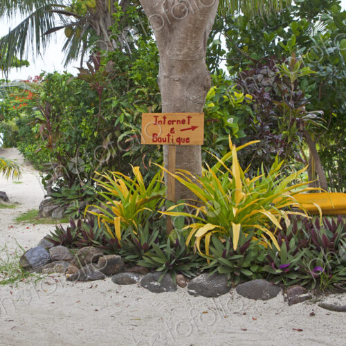 Sign Pointing To Internet And Boutiques