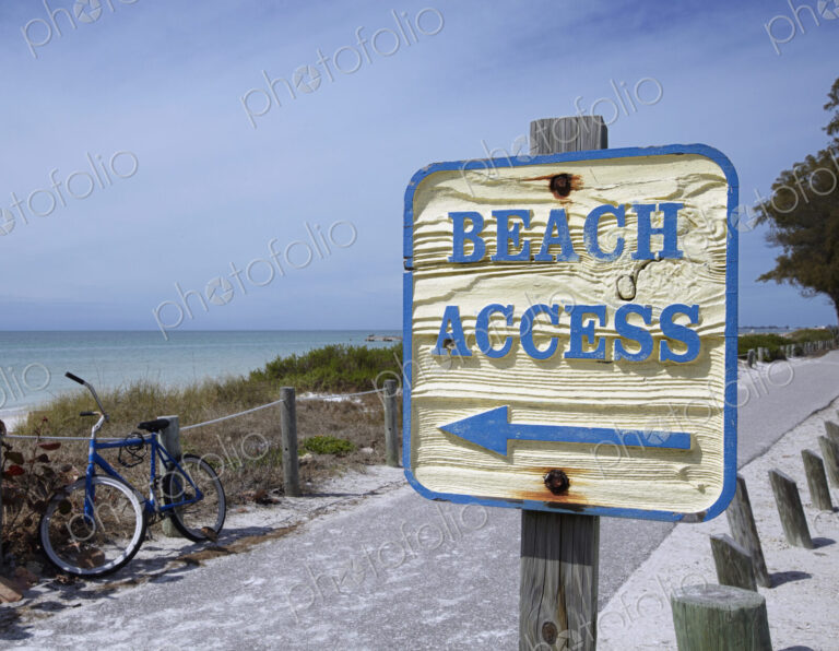 Sign Showing the Way to the Beach