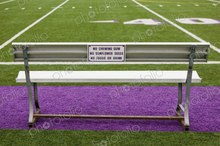 Sign on Athletic Field Bench