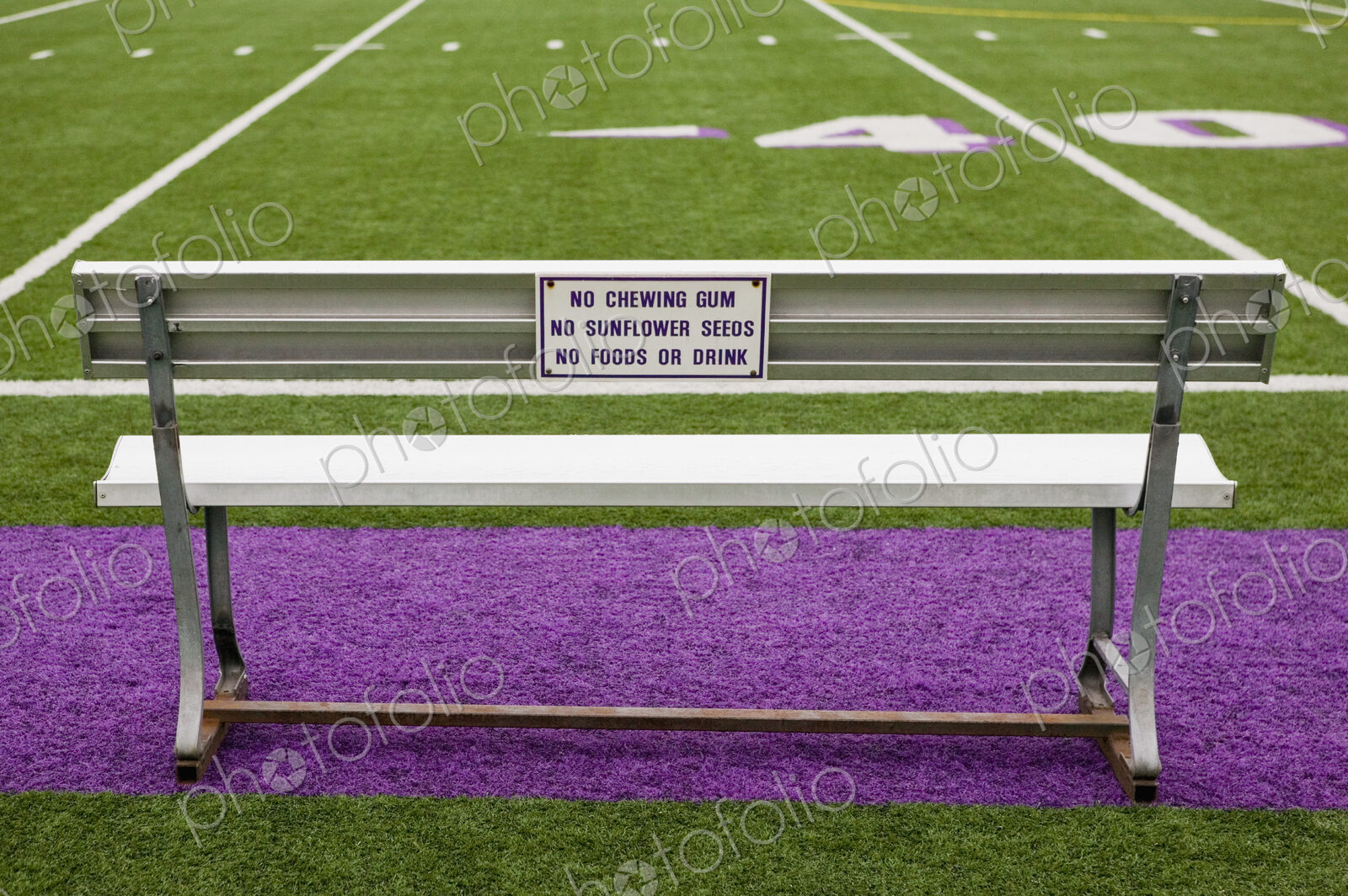 Sign on Athletic Field Bench