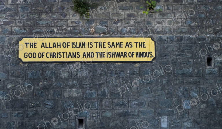 Sign on the wall, message of equality between faiths, on the Kalka-Shimla railway