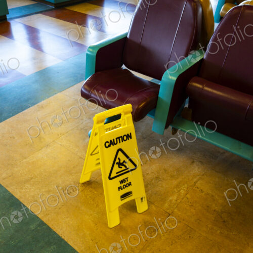 Sign warning of slippery floors, Seattle, WA USA Sign warning of slippery floors, Seattle, WA USA