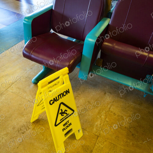 Sign warning of slippery floors, Seattle, WA USA Sign warning of slippery floors, Seattle, WA USA