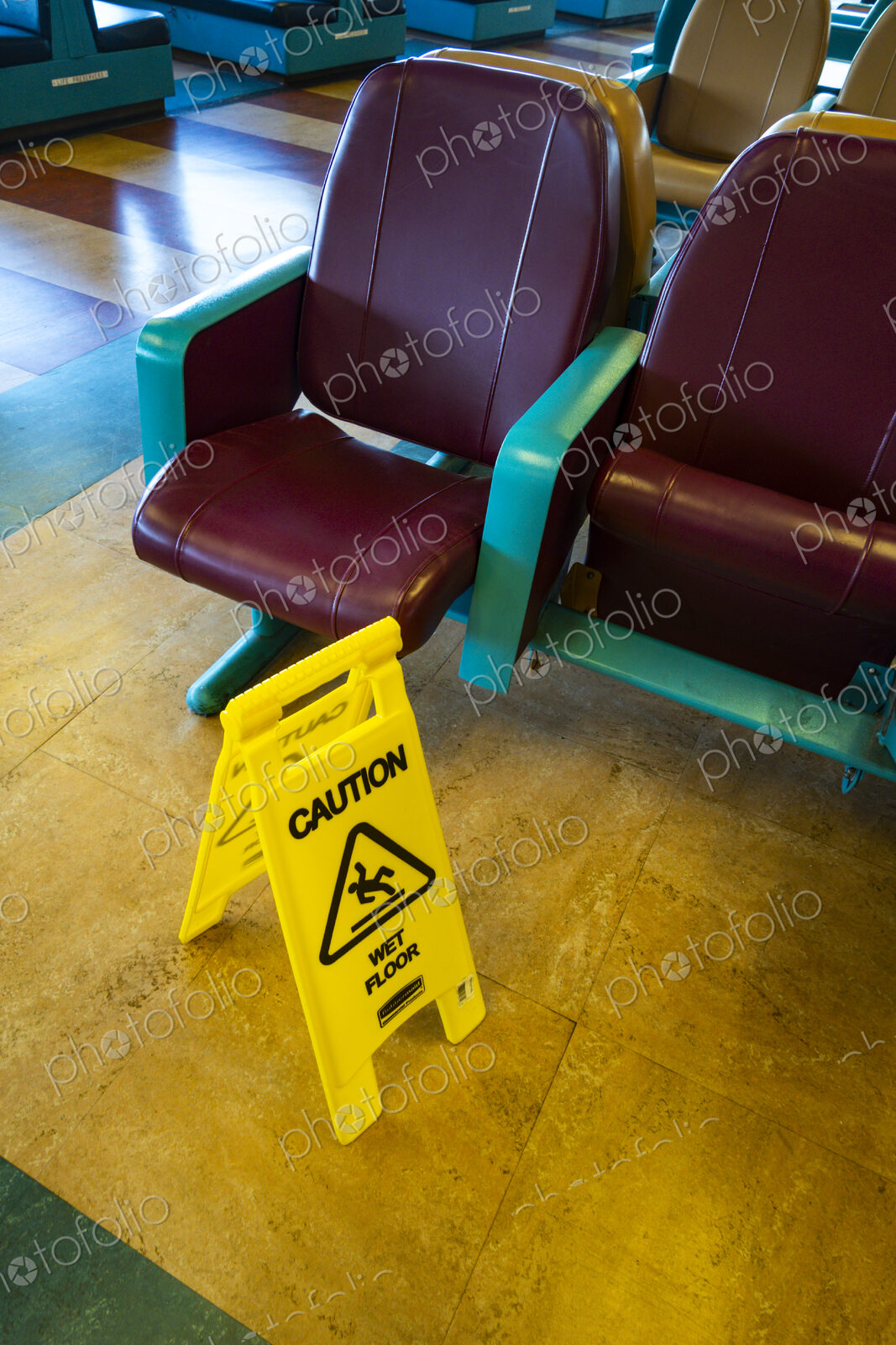 Sign warning of slippery floors, Seattle, WA USA