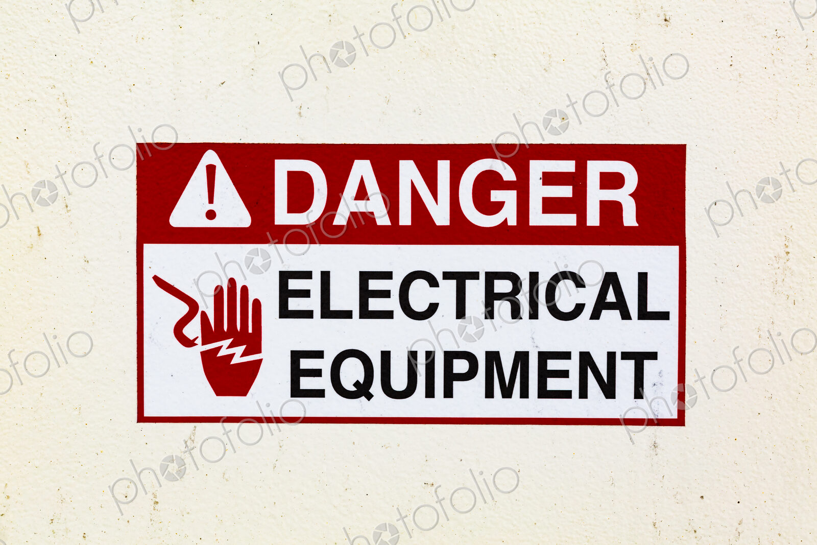 Signs on a ferry warning of electrical equipment. Danger symbol.