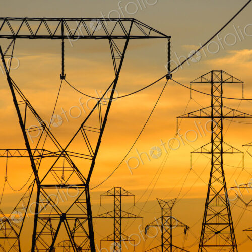 Silhouette of power lines under sunset sky Silhouette of power lines under sunset sky