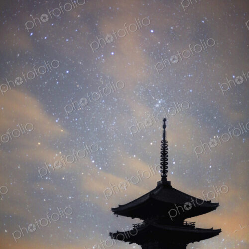 Silhouette of tall wooden pagoda of Buddhist temple against evening sky. Silhouette of tall wooden pagoda of Buddhist temple against evening sky.
