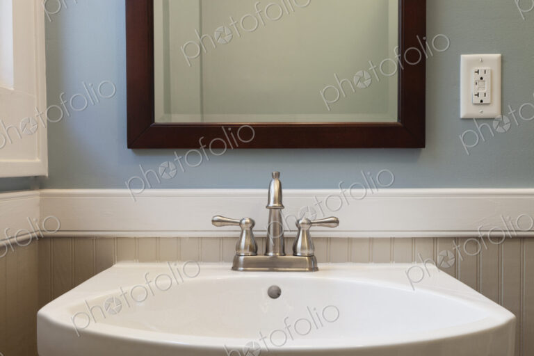 Sink and mirror in bathroom
