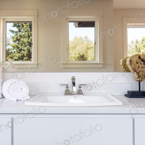 Sink and mirror in bathroom