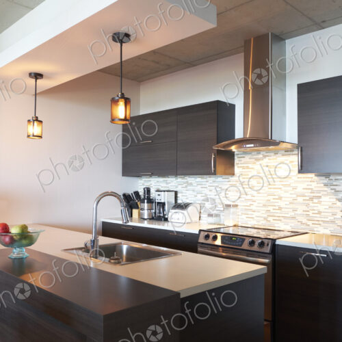 Sink and oven in modern kitchen