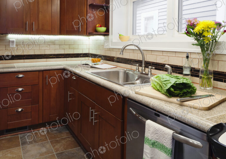 Sink, dishwasher and cabinets in kitchen