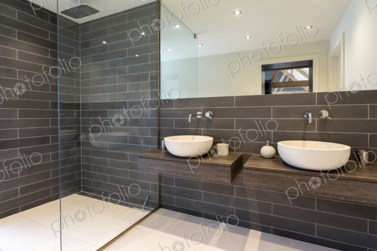 Sinks and shower in modern bathroom