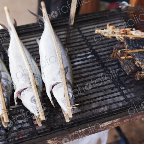 Skewered and grilled fish at the morning market in the town of Kep, Cambodia. Skewered and grilled fish at the morning market in the town of Kep, Cambodia.