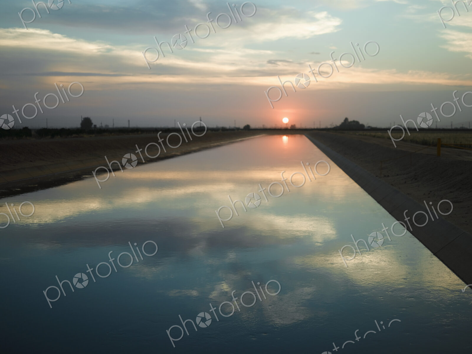 Sky reflected in a Canal at Sunset