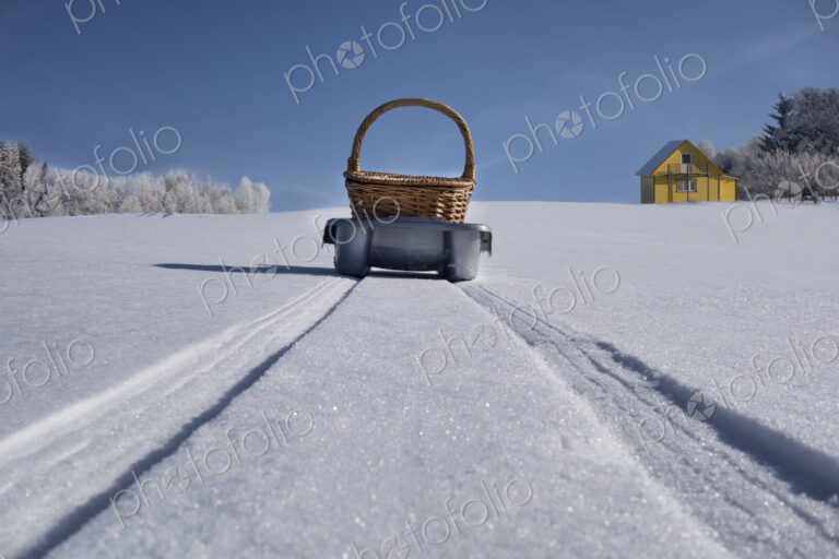 Sled transporting basket over hilly snowy winter landscape, Estonia