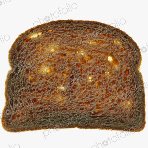 Slice of organic whole wheat bread on a white background Slice of organic whole wheat bread on a white background