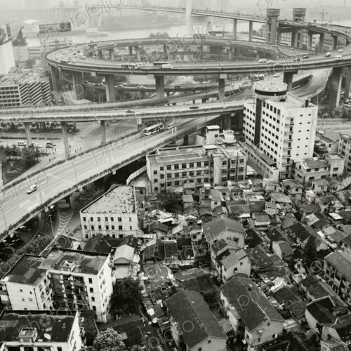 Slum Housing with Nanpu Bridge in Background Slum Housing with Nanpu Bridge in Background