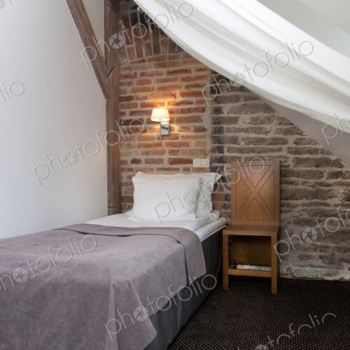 Small Bedroom With a Stone Wall Small Bedroom With a Stone Wall