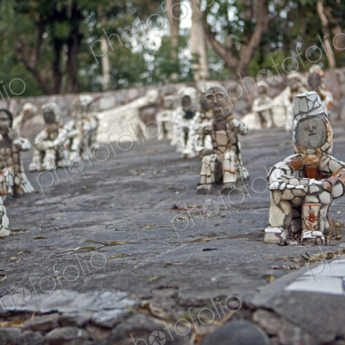 Small Figurines in Rock Garden Small Figurines in Rock Garden