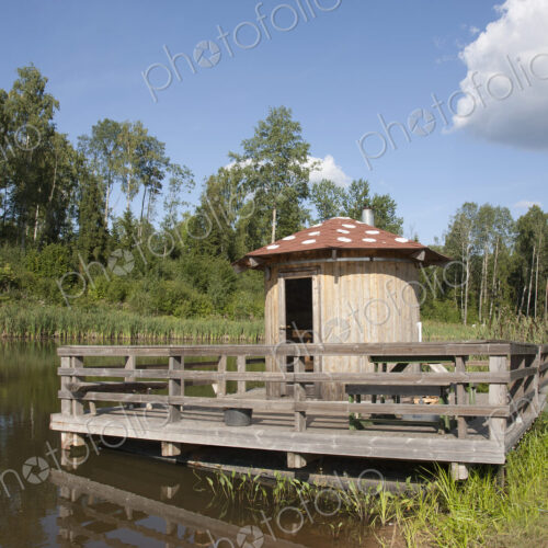 Small Hut Overlooking a Pond Small Hut Overlooking a Pond