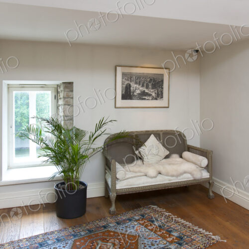 Small Sofa in a Sparse Room