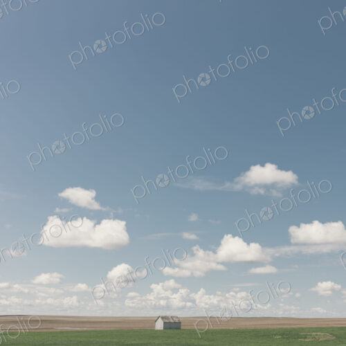 Small barn on vast open prairie, Saskatchewan, Canada.