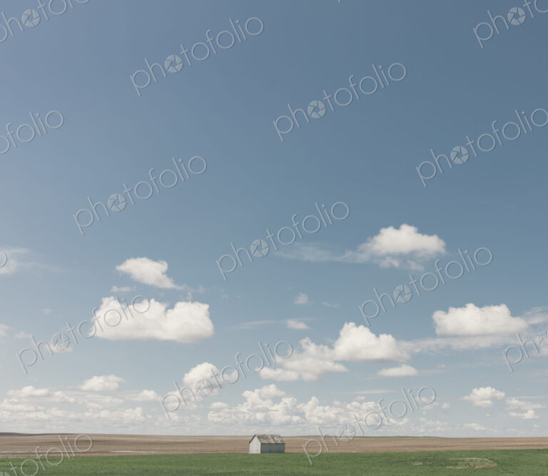 Small barn on vast open prairie, Saskatchewan, Canada.