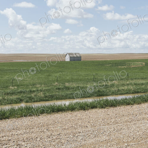 Small barn on vast open prairie, Saskatchewan, Canada.