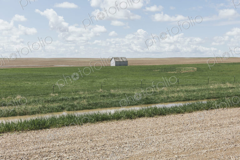 Small barn on vast open prairie, Saskatchewan, Canada.