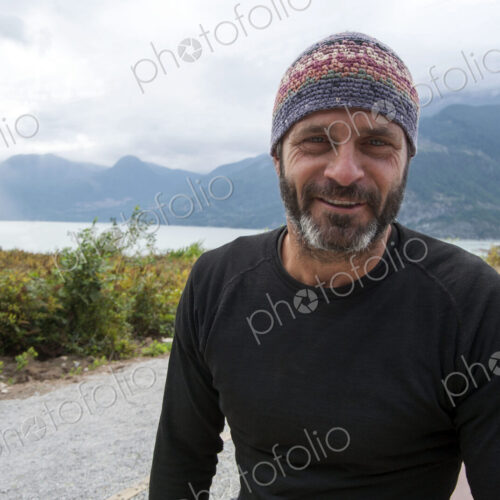 Smiling man wearing beanie hat outdoors Smiling man wearing beanie hat outdoors