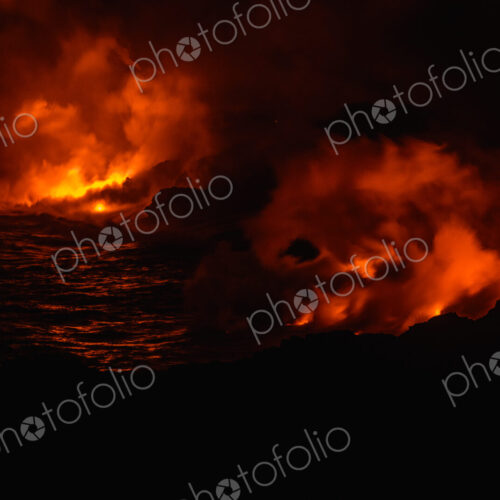 Smoke from molten lava at night Smoke from molten lava at night