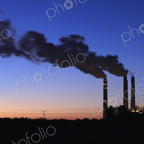 Smokestacks Billowing Smoke At Night Smokestacks Billowing Smoke At Night