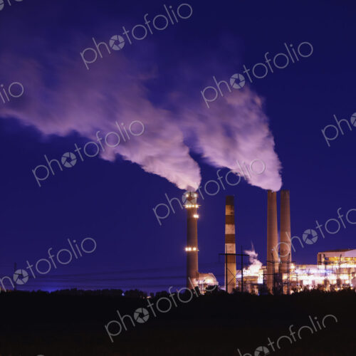 Smokestacks Billowing Smoke At Night Smokestacks Billowing Smoke At Night