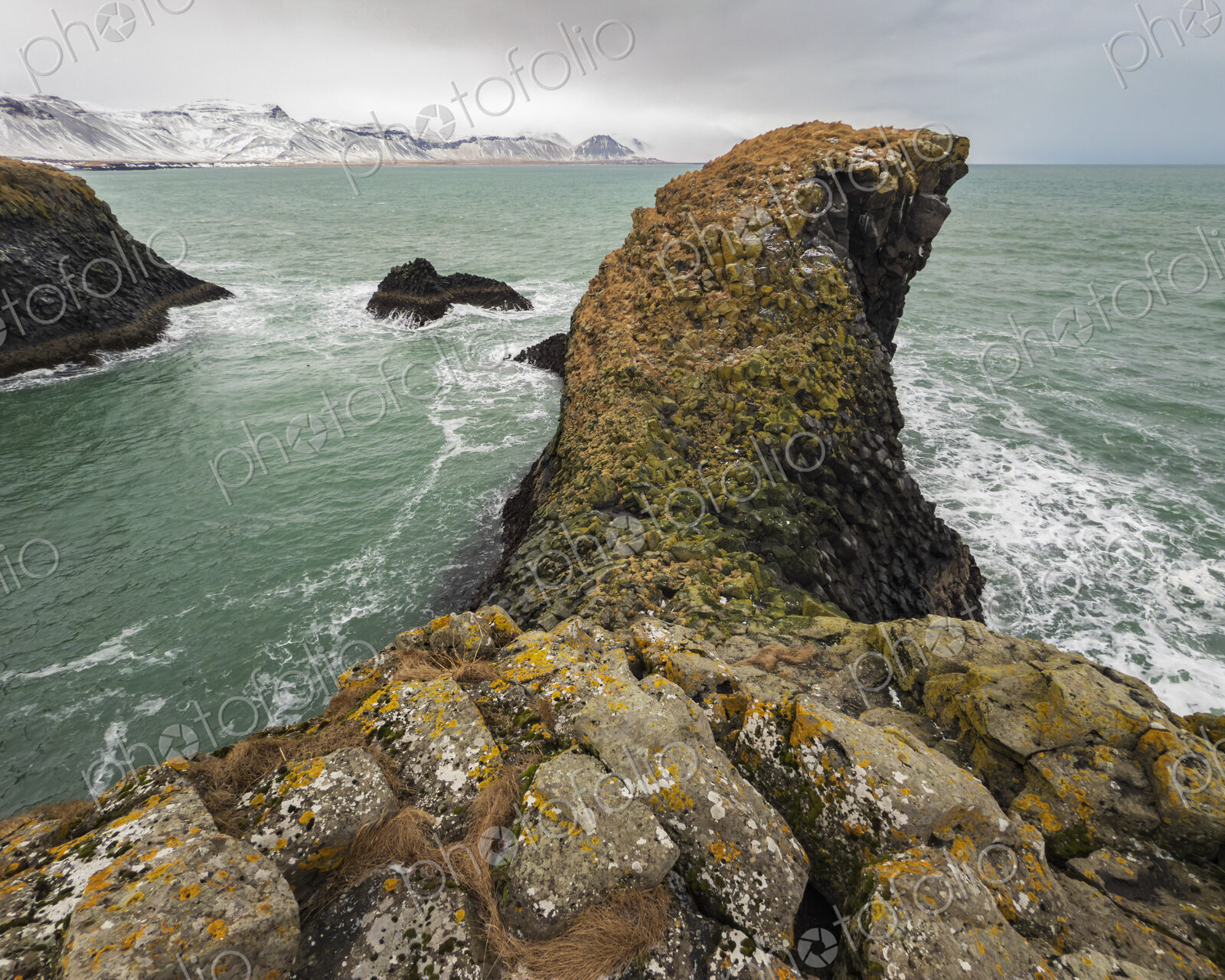 Snaefellsness Peninsula, the rocky coastline, volcanic rocks and inlets near Arnastapi.