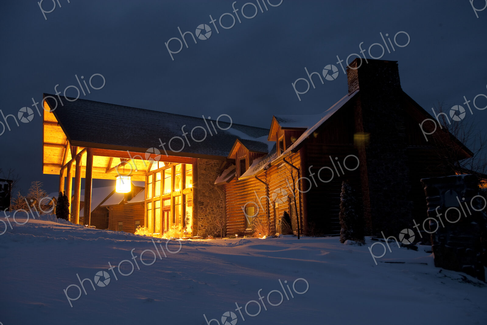 Snow Covered Countryside Hotel at Night
