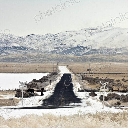 Snow Covered Railroad Crossing