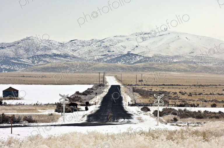 Snow Covered Railroad Crossing