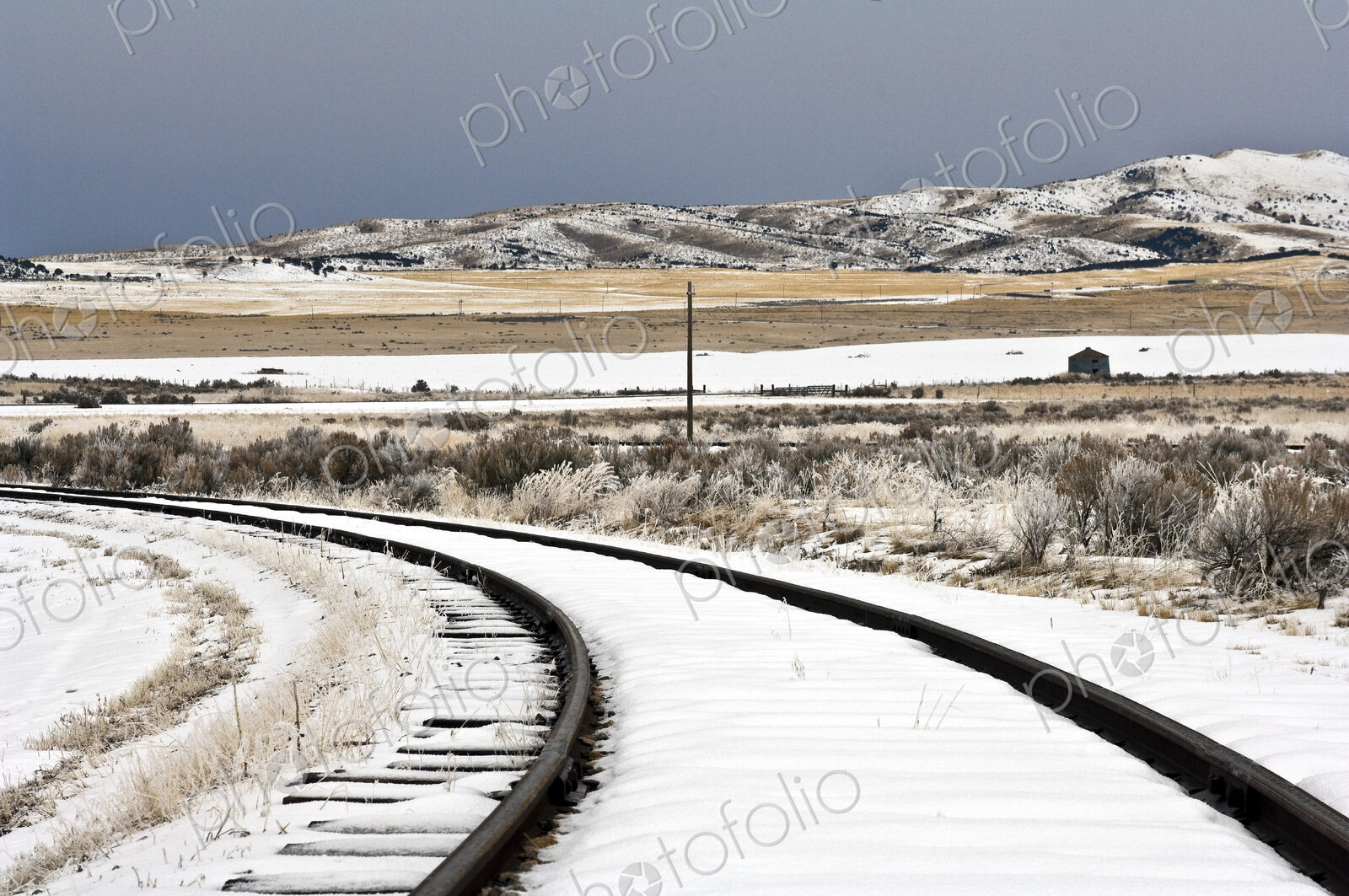 Snow Covered Railroad Tracks
