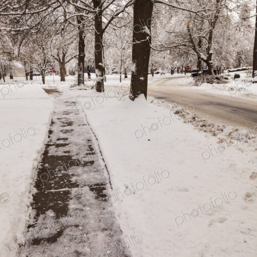 Snow and ice covered sidewalk, Spokane, WA USA Snow and ice covered sidewalk, Spokane, WA USA