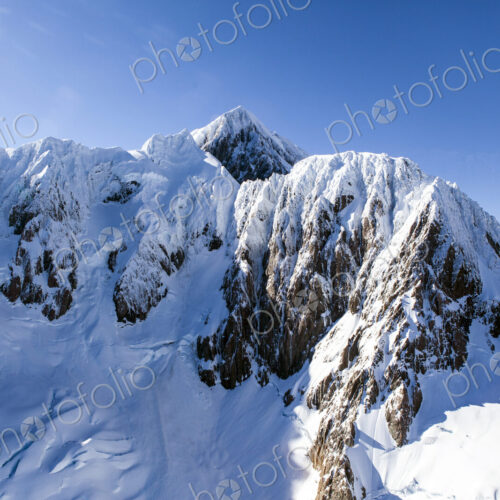 Snow on sunny mountain Snow on sunny mountain
