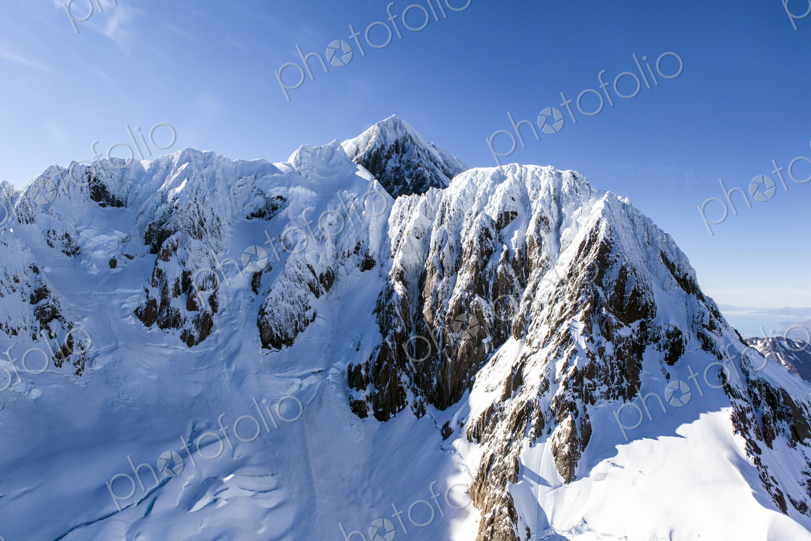 Snow on sunny mountain